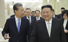 In this photo provided by the North Korean government, North Korean leader Kim Jong Un, right, meets Zhao Leji, chairman of the National People's Congress of China, in Pyongyang, North Korea on April 13, 2024.