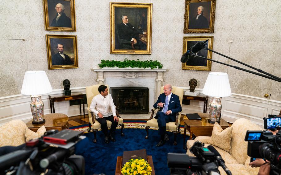 President Joe Biden and Philippines President President Ferdinand Marcos Jr. talk during a meeting in the Oval Office of the White House.
