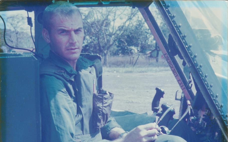 Then-1st Lt. Larry Taylor sitting in a UH-1 “Huey” helicopter in an undated photo. After completing flight training, Taylor was assigned to one of the Army’s first Cobra helicopter companies in Vietnam where he served from August 1967 to August 1968. 