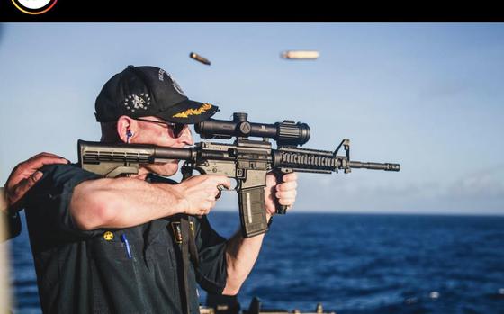 The Navy removed a post on its official Instagram account Wednesday, April 10, 2024, showing a warship commander firing a rifle with a backwards scope. 
