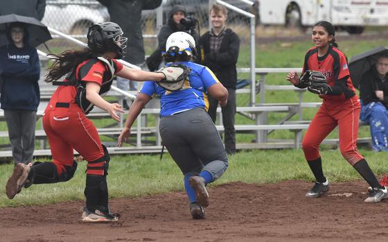 Kaiserslautern catcher Alessia Garcia tags out Wiesbaden team captain Kayla Pham on March 16, 2024.  Pham was running back to third base after attempting to steal home. 
