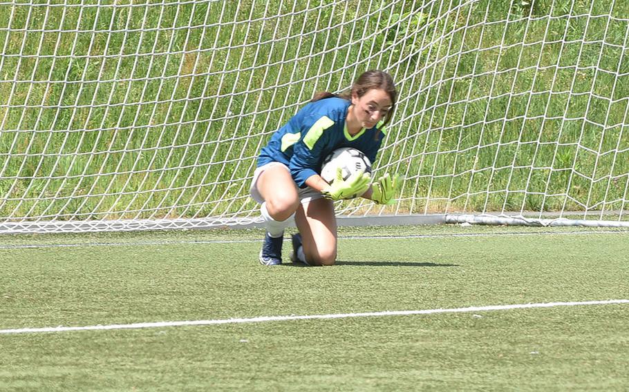 Naples goalkeeper Sabrina Elrod corrals a shot from Vicenza in the DODEA-Europe girls Division II soccer championships on Tuesday, May 17, 2022, at Landstuhl, Germany.