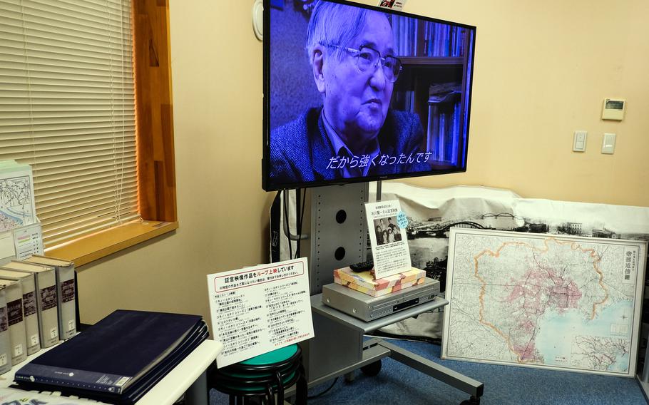 An air raid survivor recounts his story in the video library at the Center of the Tokyo Raids and War Damage in Tokyo, April 22, 2025.