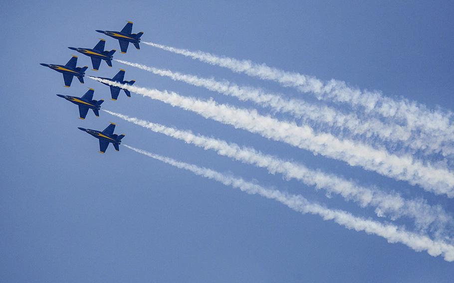 The Blue Angels take to the skies over Oceana Naval Air Station, during a practice run for the 2014 NAS Oceana Air Show.