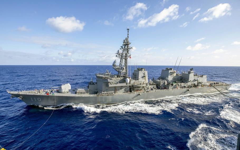 A ship at sea, with the sea taking up the bottom half of the image and sky taking up the top half.