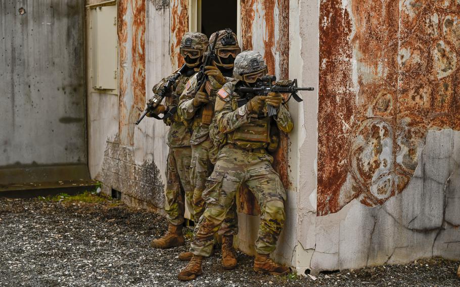 Soldiers train at Joint Base Lewis-McChord, Wash., on Feb. 10, 2022. A year earlier, more than 140 soldiers in an unspecified infantry battalion at the base became infected with COVID-19, hampering the unit's readiness, according to a report in a military medical journal.