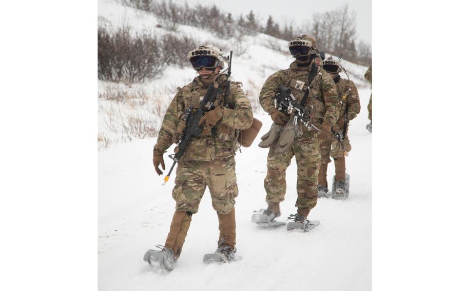 Troops test the Integrated Visual Augmentation System (IVAS), an augmented reality goggle based on Microsoft’s HoloLens, at the Army Test and Evaluation Command’s Cold Regions Test Center at Fort Greely, Alaska, in March 2021.