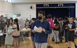 Middle- and high-school students attend a Career Day event at the home of U.S. Forces Japan in western Tokyo, Thursday, May 5, 2022. 