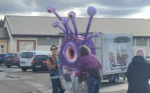 Volunteers from KMC Onstage push a shopping cart containing a monster for the production of She Kills Monsters on Monday, Feb. 26, 2024.