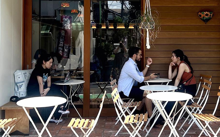 Cafe RoJean in Tokyo seems straight out of Kansas, with a warm, inviting interior set with Mason jars and clay pottery.