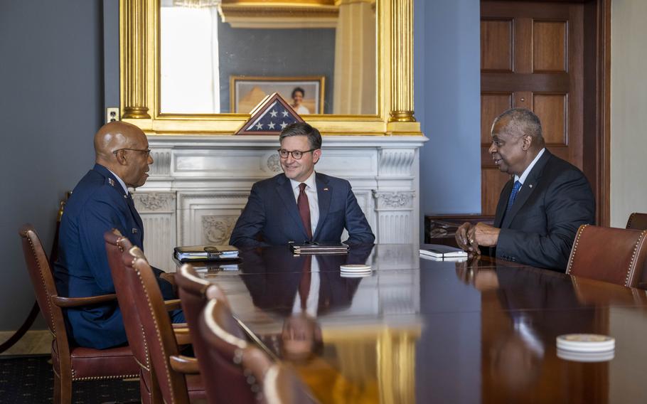 Defense Secretary Lloyd Austin and Air Force Gen. Charles “CQ” Brown, chairman of the Joint Chiefs of Staff, meet with House Speaker Mike Johnson, R-La., at the Capitol Building in Washington, D.C., Nov. 1, 2023. 