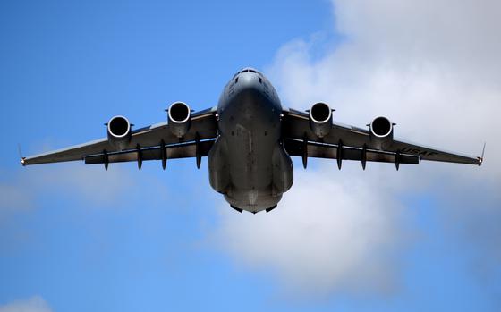 An Air Force C-17 Globemaster III takes off from Andersen Air Force Base, Guam, June 6, 2017. A Globemaster from Andersen found two missing fishermen from a tiny atoll in the Pacific on July 13, 2023.