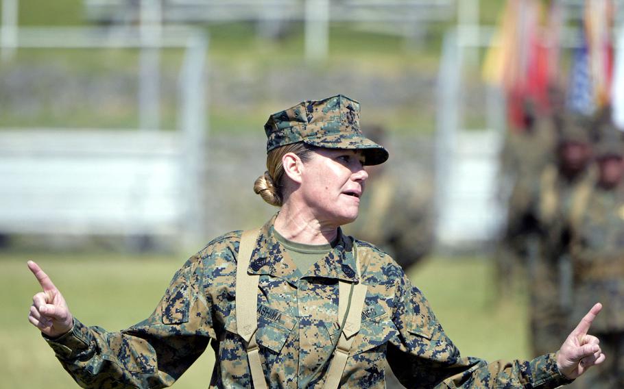 Marine Sgt. Maj. Joy Kitashima, the III Marine Expeditionary Force's new sergeant major, speaks during a relief-and-appointment ceremony at Camp Courtney, Okinawa, March 7, 2023.
