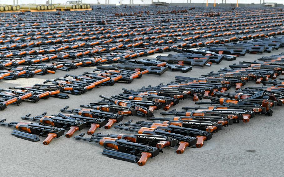 Some of the more than 3,000 rifles seized by the French military, with help from U.S. air surveillance, are displayed following their capture aboard a ship in the waters of the Middle East, Jan. 15, 2023. U.S. Central Command announced the seizures Wednesday.