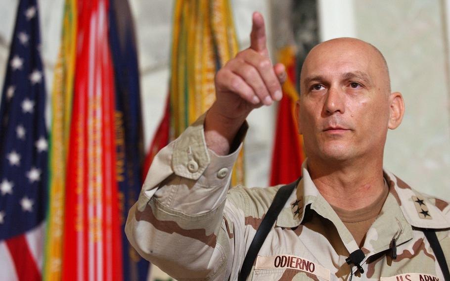 In this Aug. 7, 2003 file photo, Major Gen. Raymond Odierno, commander of the U.S. Army Fourth Infantry Division gestures during a news conference in Tikrit, about 112 miles northwest of Baghdad, Iraq.  Odierno, a retired Army general who commanded American and coalition forces in Iraq at the height of the war and capped a 39-year career by serving as the Army’s chief of staff, has died, his family said Saturday, Oct. 9, 2021. He was 67. 