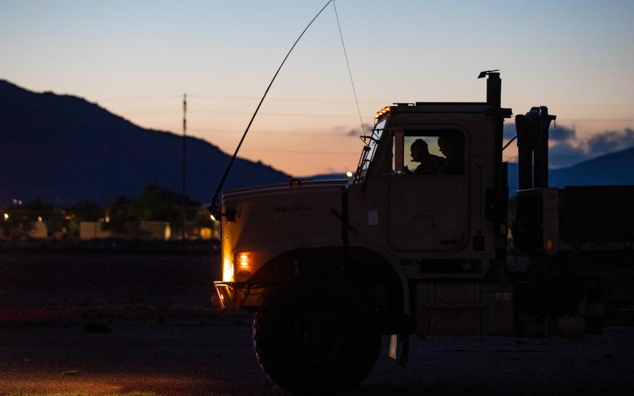 Marines prepare to depart from Kirkland Air Force Base, N. M., May 13, 2021.  Marines in tactical vehicles and trucks drove from Camp Lejeune, N.C., to Twentynine Palms, Calif., in one of the longest convoys in the service's history.