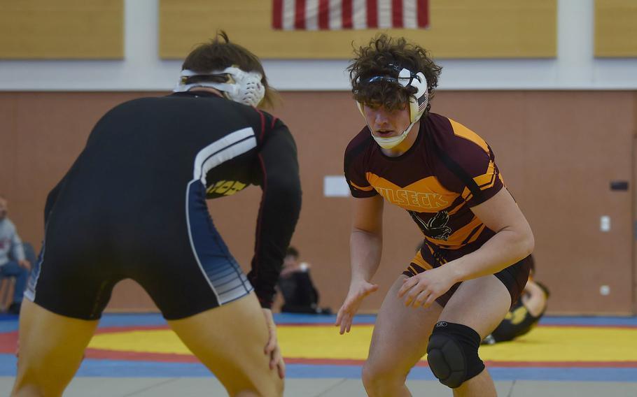 Vilseck Junior Garrett Hyten circles the mat with his second opponent of the day, Hohenfels junior Joel Workman.