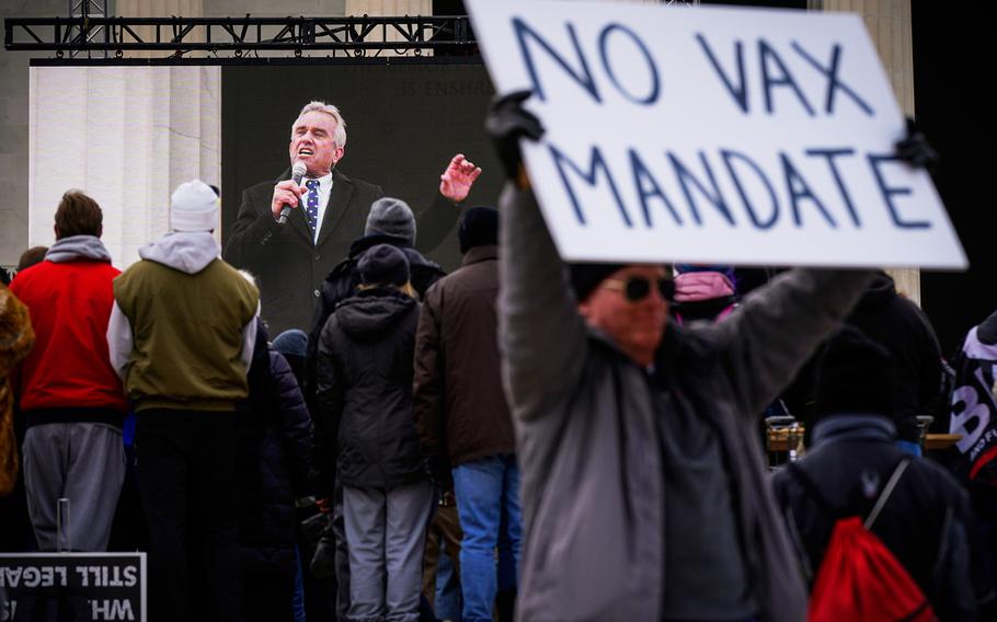 Robert F. Kennedy Jr., is broadcast on a large screen as he speaks during an anti-vaccine rally in front of the Lincoln Memorial in Washington.