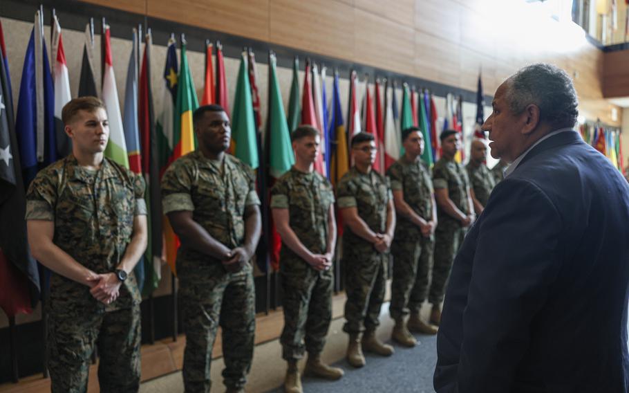 Navy Secretary Carlos Del Toro speaks to members of the Marine Corps embassy security group who assisted with the recent evacuation in Sudan. The Marines were honored during a ceremony at Marine Corps Base Quantico, Va., May 19, 2023. 