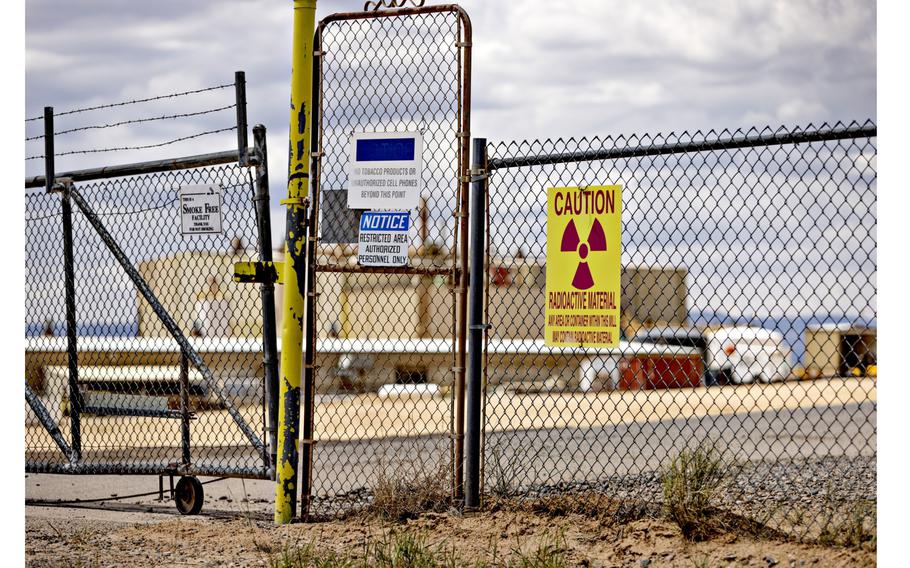 Signs warn about radioactive materials outside White Mesa Mill. 