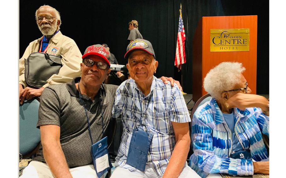 Tuskegee Airmen historian Aubrey Matthews, front left, with Tuskegee Airman Lt. Col. Harry Stewart, one of the U.S. Air Force’s first top pilots. Behind Matthews is Ted Lumpkin, who was a Tuskegee Airmen intelligence officer.