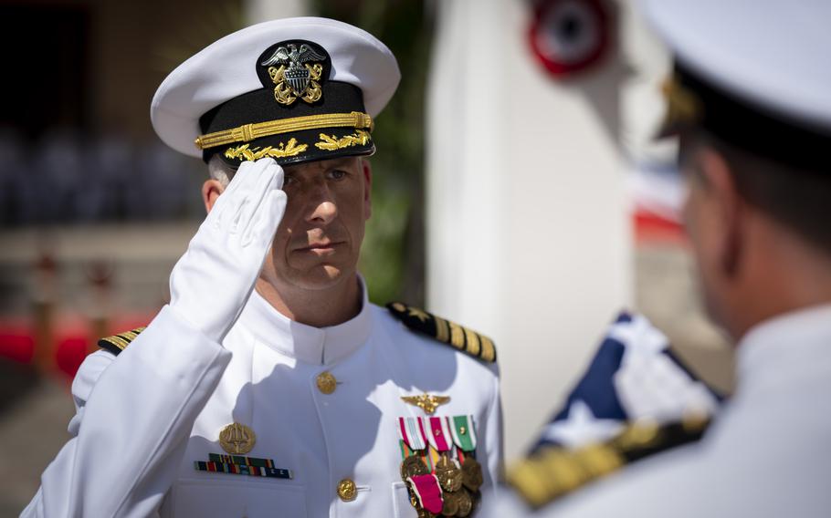 Capt. James Stewart, former commander of U.S. Naval Support Activity Naples, receives the flag at his retirement and change of command ceremony July 7, 2023.