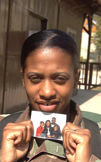 Sgt. Taheerah Armour is a military police investigator in Bosnia and Herzegovina. Her children, Tanzinia, 6, and Shakayla, 2, are in Georgia. This will be a sad Mother's Day, the soldier said.