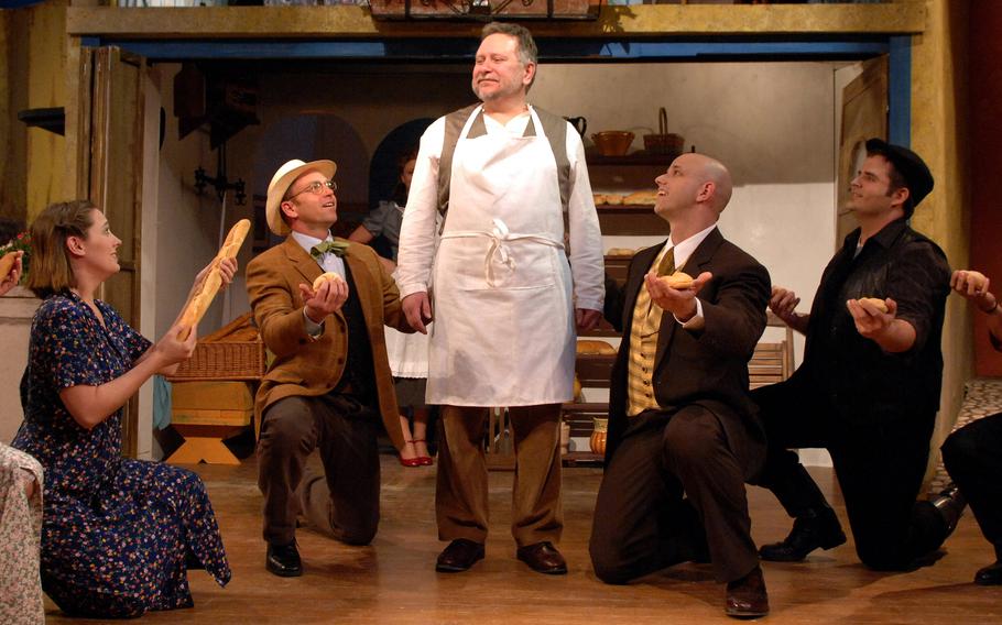 Frank Lewandowski, center, as the baker Aimable during a dress rehearsal of  the Aviano Community Theater's " The Bakers Wife" in 2008. Lewandowski, a beloved teacher at Aviano Middle High School, passed away Aug. 28, 2021, at Aviano, Italy. 