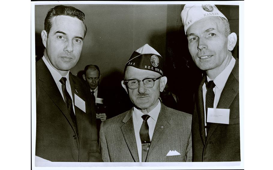 Bob Dole with two veterans in the 1960s.