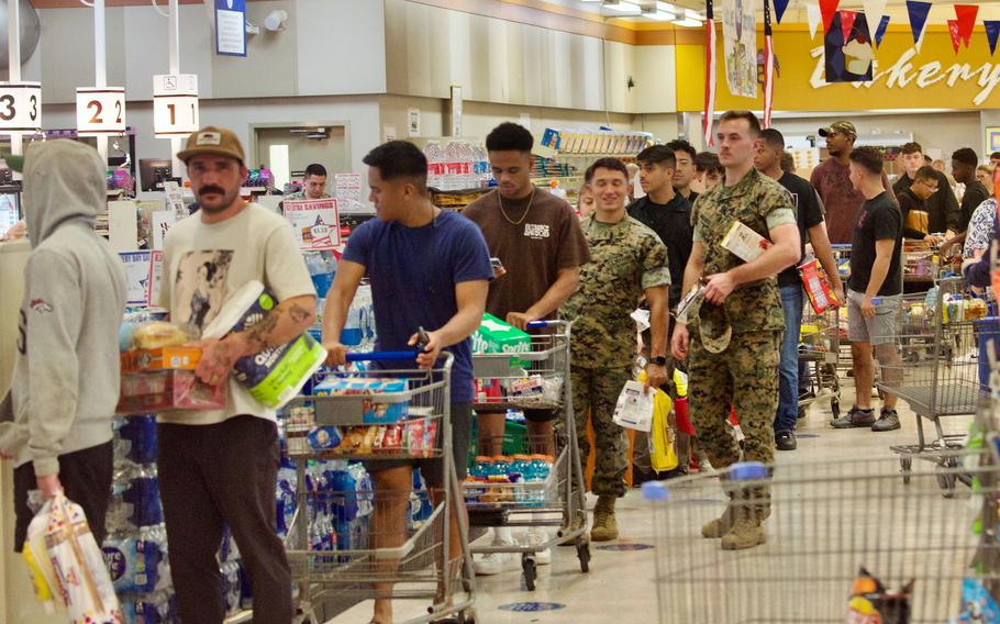 Patrons flock to the Camp Foster commissary, Thursday, Aug. 3, 2023, to stock up on supplies in the wake of Typhoon Khanun.