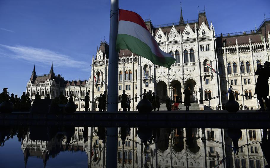 The official flag raising ceremony for the 66th anniversary of Hungarian anti-communist uprising of 1956 in front of the Parliament in Budapest, Hungary on Oct. 23, 2022. A long-delayed vote in Hungary’s parliament on ratifying the NATO accession bids of Sweden and Finland will likely be postponed again following a proposal from a senior government official.