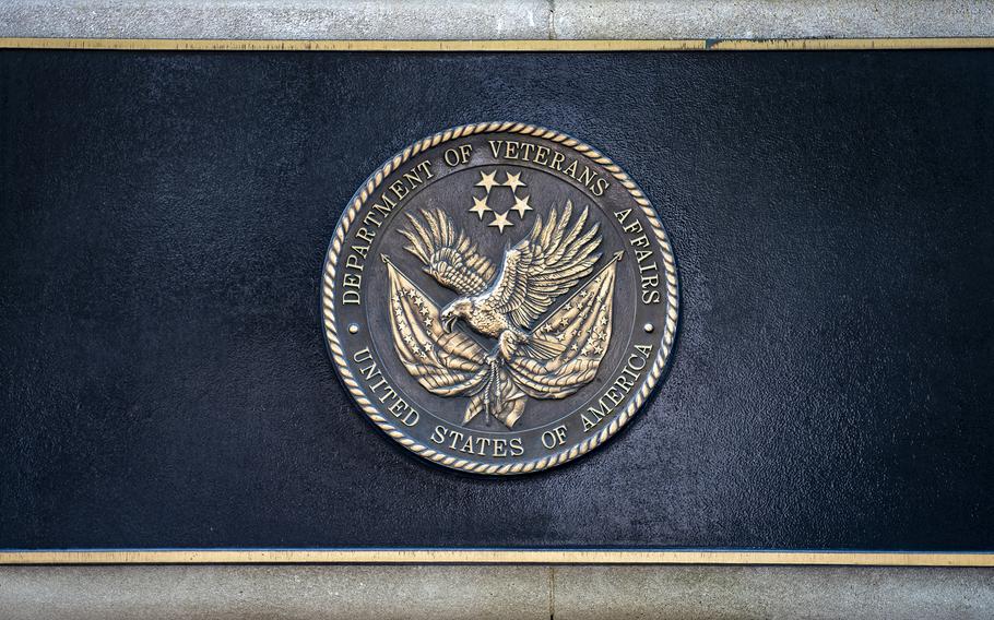 The VA logo is seen at the entrance to the Veterans Affairs building in Washington, DC on July 6, 2022.