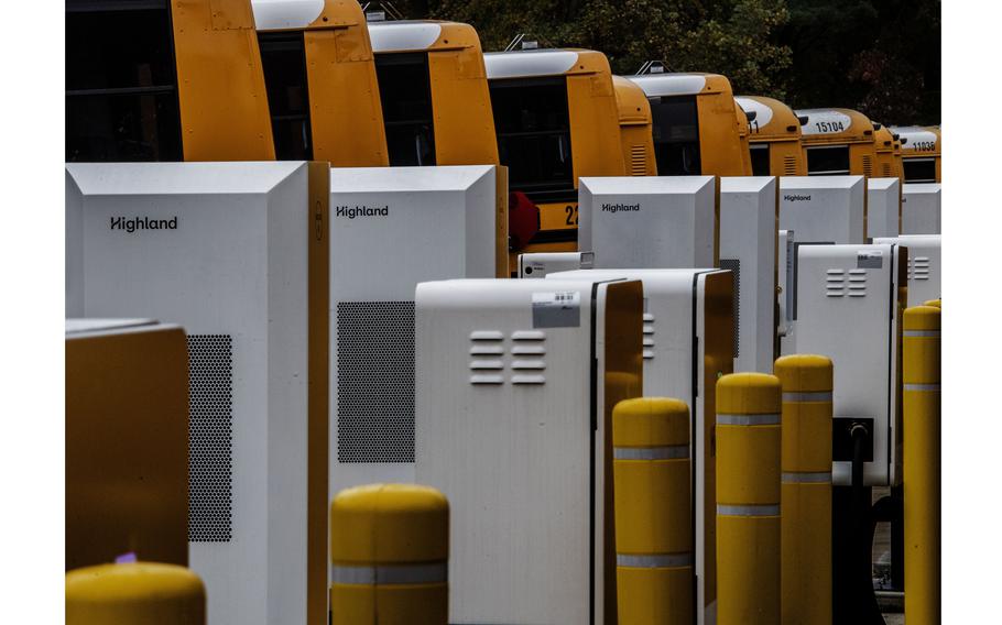 Buses connected to charging station. 