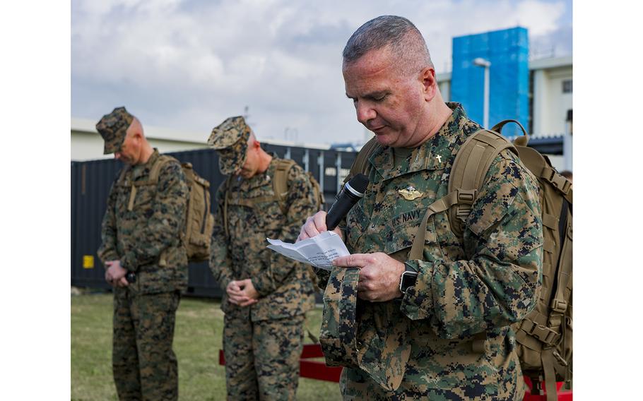 Navy Chaplain Jon E. Settlemoir gives the invocation prior to an event at Camp Foster, Okinawa, Japan on Jan. 16, 2019.  