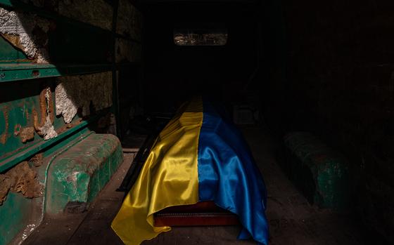 The casket of a Ukrainian soldier is seen inside a van after a military service in Odessa, Ukraine, on March 29, 2022. MUST CREDIT: Salwan Georges/The Washington Post
