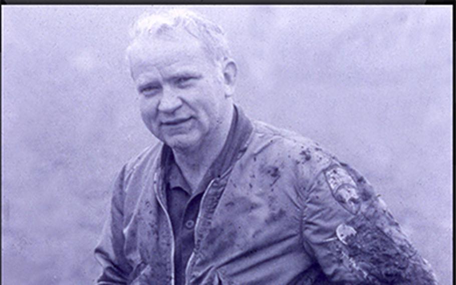 ; 
Retired U.S. Air Force Col. James Tonge is seen here in this undated photo, covered in mud after extracting a vehicle that became stuck in Magdeburg, Germany. Never-before-seen Stasi documents indicate that Tonge and another U.S. Air Force officer, Lt. Col. Bill Burhans, were subject to a “targeted measure to discredit” them in Germany on Dec. 29, 1979 by the Soviets.