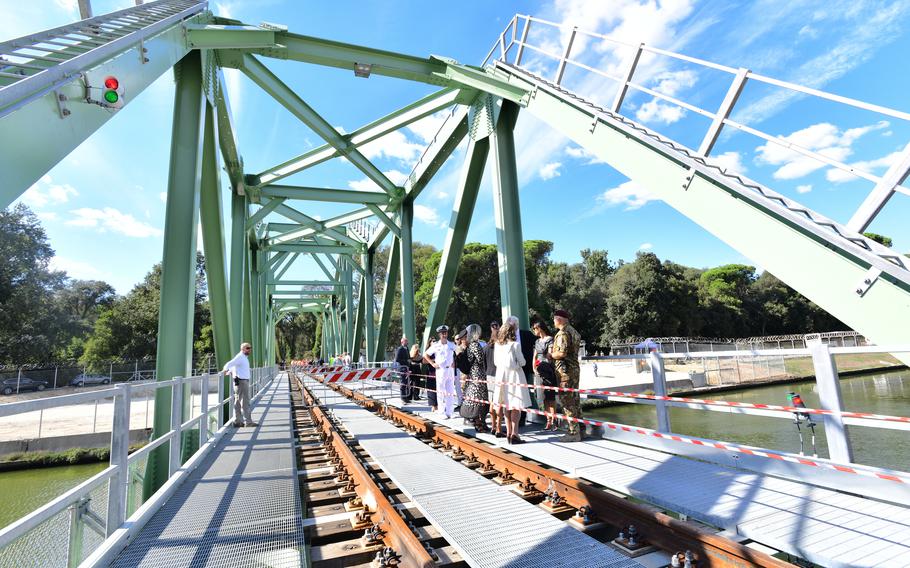 Officials cross the revolving bridge over the Navicelli Canal at Camp Darby, Pisa Ammunition Storage Area Italy, Sept. 22, 2022. The 16th century waterway was funded by the Medici family of Florence and connects the port with Pisa.