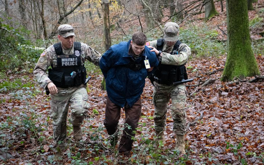 An escaped prisoner is apprehended during an exercise at Sembach Kaserne, Germany, Dec. 14, 2023. 