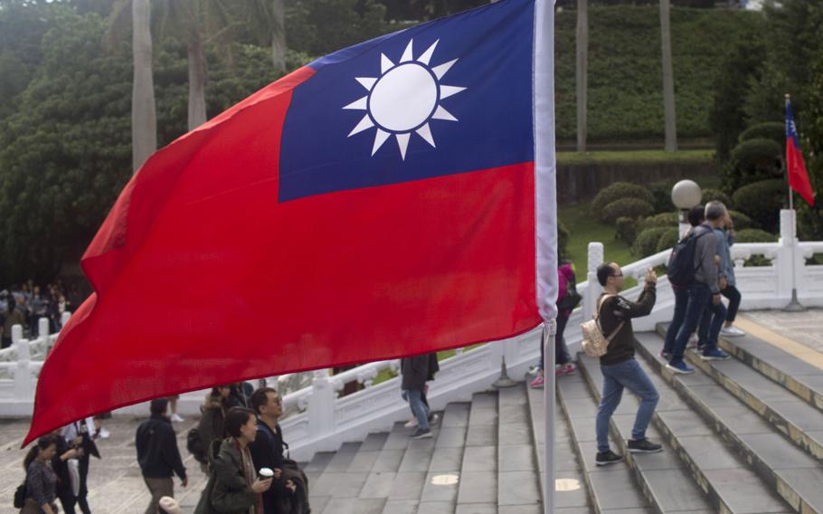 A Taiwan flag stands at the National Palace Museum in Taipei, Taiwan, on Dec. 29, 2017. MUST CREDIT: Bloomberg photo by Brent Lewin.