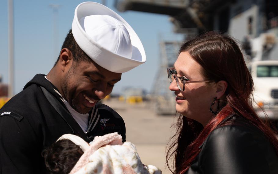 Aviation Boatswain’s Mate (Handling) 2nd Class Kareem Moore, assigned to the Wasp-class amphibious assault ship USS Bataan (LHD 5), part of the Bataan Amphibious Ready Group (ARG), greets his family as Bataan returns to Naval Station Norfolk following an eight-month deployment operating in the U.S. 5th and U.S. 6th Fleet areas of operation, Thursday, March 21, 2024.
