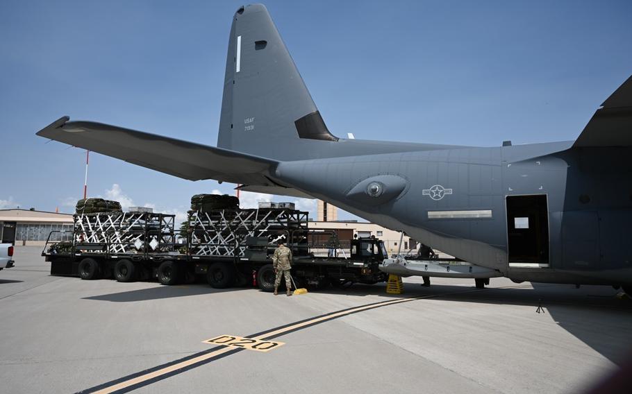Airmen load a Rapid Dragon deployment system onto an MC-130J aircraft ahead of an airdrop in November 2021 at Eglin Air force Base, Fla. Special operations forces deployed the system in a demonstration over the Arctic on Nov. 9, 2022.
