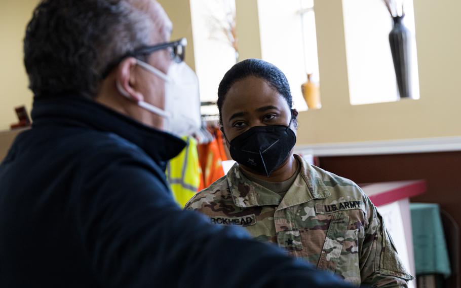 U.S. Army Brig. Gen. Janeen Birckhead, commander of the Maryland Army National Guard (right) and Bishop Angel Nunez, senior pastor of the Bilingual Christian Church of Baltimore, discuss the impacts of COVID-19 and the outreach efforts performed by his community to minimize the spread, Jan. 24, 2022, in Baltimore, Md.