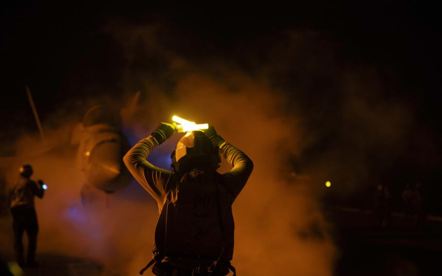 An aircraft prepares to launch from USS Dwight D. Eisenhower during flight operations in the Red Sea, Jan. 22, 2024.