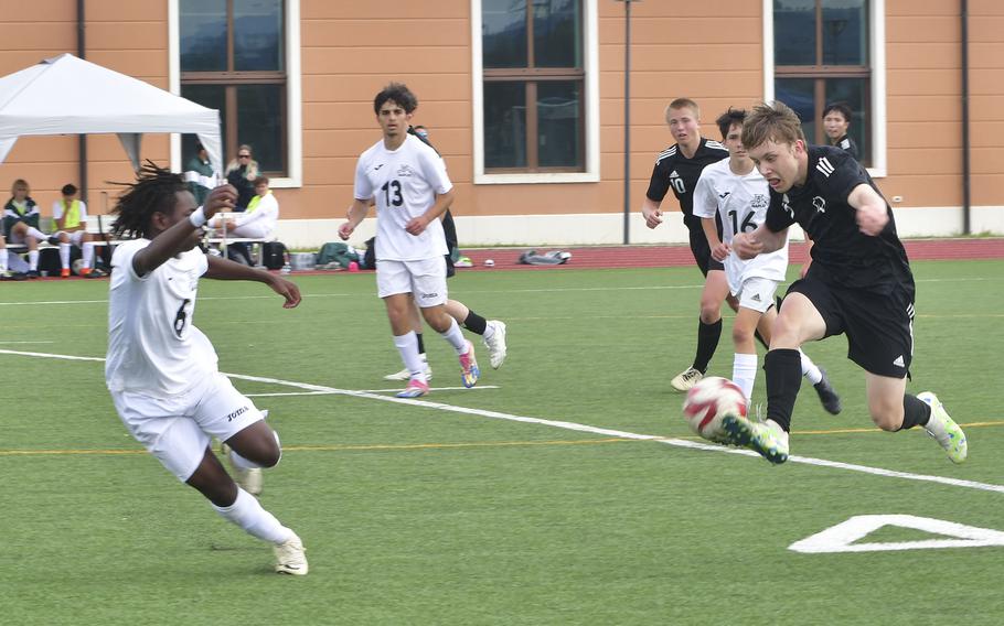 Karl Kukk of the Vicenza Cougars attempts to move the ball upfield against the Naples Wildcats during a soccer match Saturday, April 27, 2024 on Caserma Del Din. 