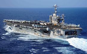 The aircraft carrier USS George Washington transits the Pacific Ocean. George Washington, the Navy's only permanently forward-deployed aircraft carrier, is participating in Annual Exercise, a yearly bilateral exercise with the U.S. Navy and the Japan Maritime Self-Defense Force.