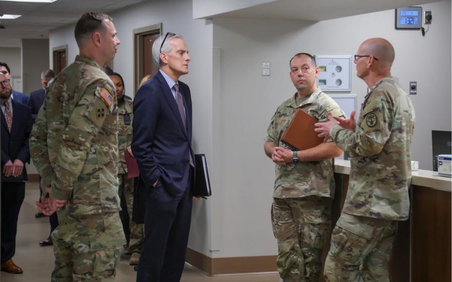 Denis McDonough, secretary of the Department of Veterans Affairs, tours a new VA out-patient clinic at Fort Campbell, Ky., in January 2024. 