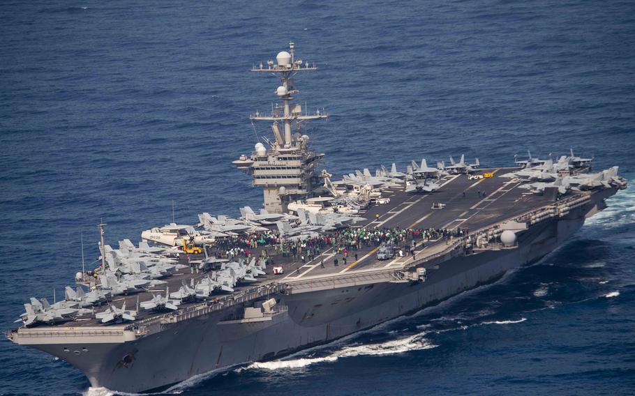 U.S. sailors conduct a foreign object debris walkdown on the flight deck of the aircraft carrier USS John C. Stennis (CVN 74) while transiting the Strait of Gibraltar, May 3, 2019.