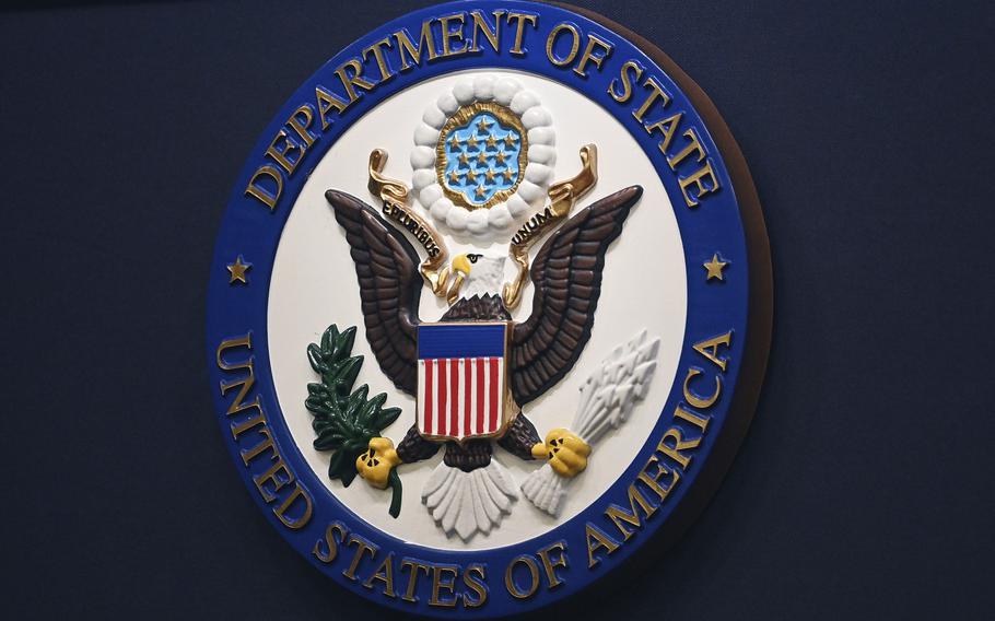 The State Department seal on the briefing room lectern at the State Department in Washington.
