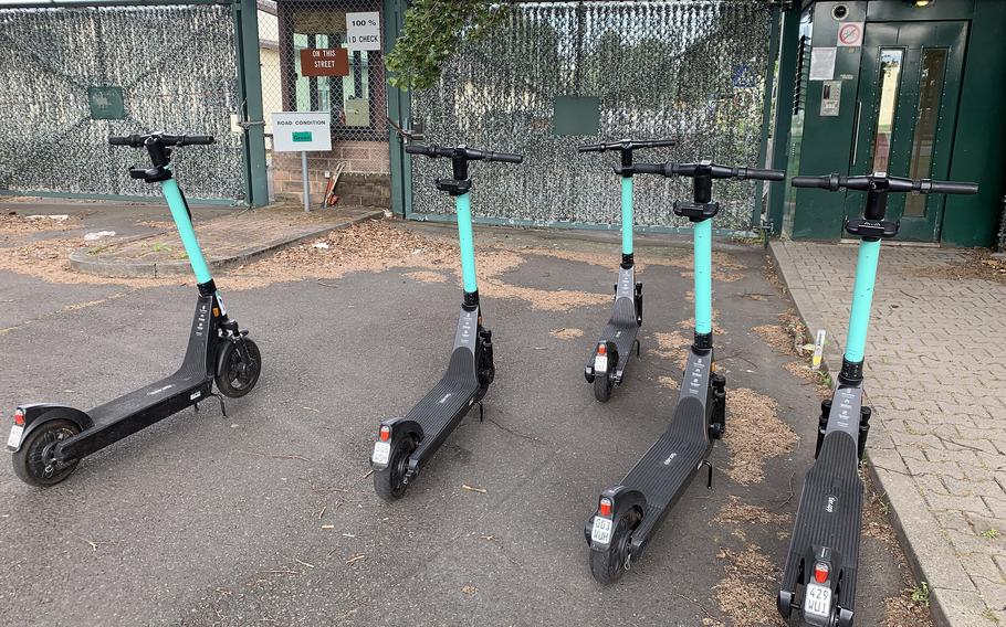 Electric scooters stand outside the gates of Kleber Kaserne in Kaiserslautern, Germany in 2020. For soldiers of the 1st Armored Brigade Combat Team, 3rd Infantry Division deployed to Grafenwoehr, alcohol is now off limits after a series of incidents that involved intoxicated soldiers riding e-scooters, Army officials said this week.