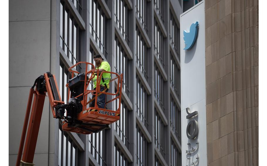 The blue bird logo and the last two letters of the Twitter name remain on a sign at the social media company’s headquarters in San Francisco on July 24, 2023. Since then, new owner Elon Musk has rebranded Twitter with the name “X.” 